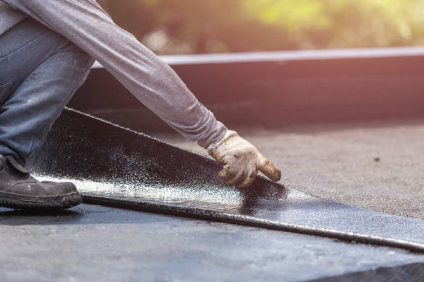 Professional Basement Waterproofing technician working in Burnett, WI